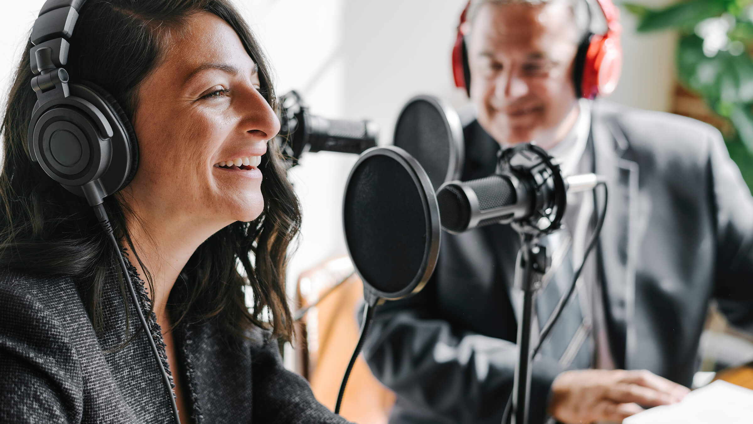 Two people speaking in a broadcast}